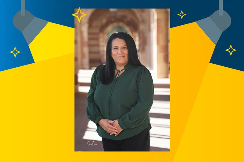 Carina Salazar posing for a photo with the vice chancellor of Student Affairs