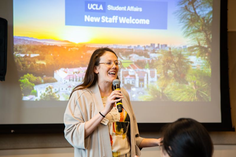 Jenny Byrd presenting in front of a group of new UCLA Student Affairs staff