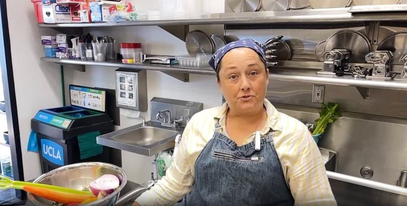 Julia Rhoton, culinary arts coordinator for the UCLA Teaching Kitchen, helps students prepare a mini-Thanksgiving meal with turkey tenderloins, cranberry sauce, smashed potatoes and more.